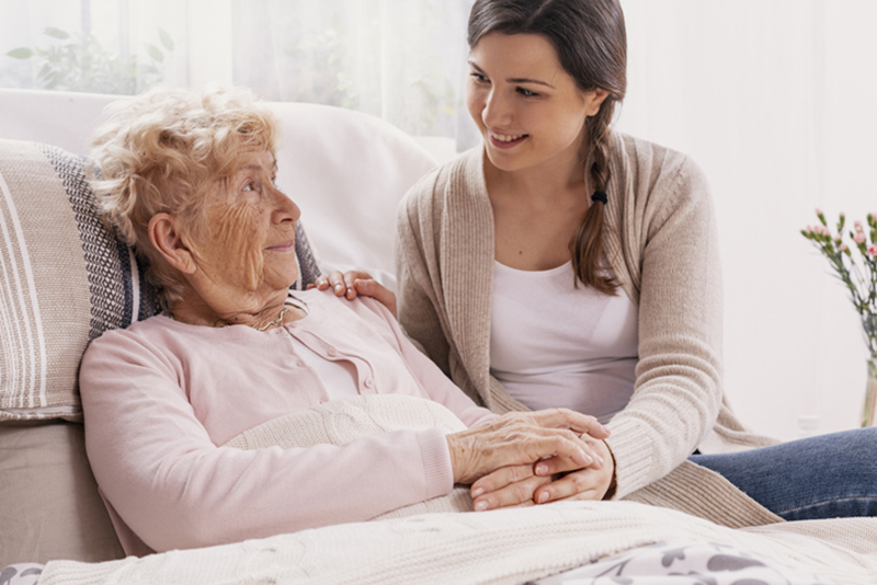 hospice-caregiver-with-senior-woman