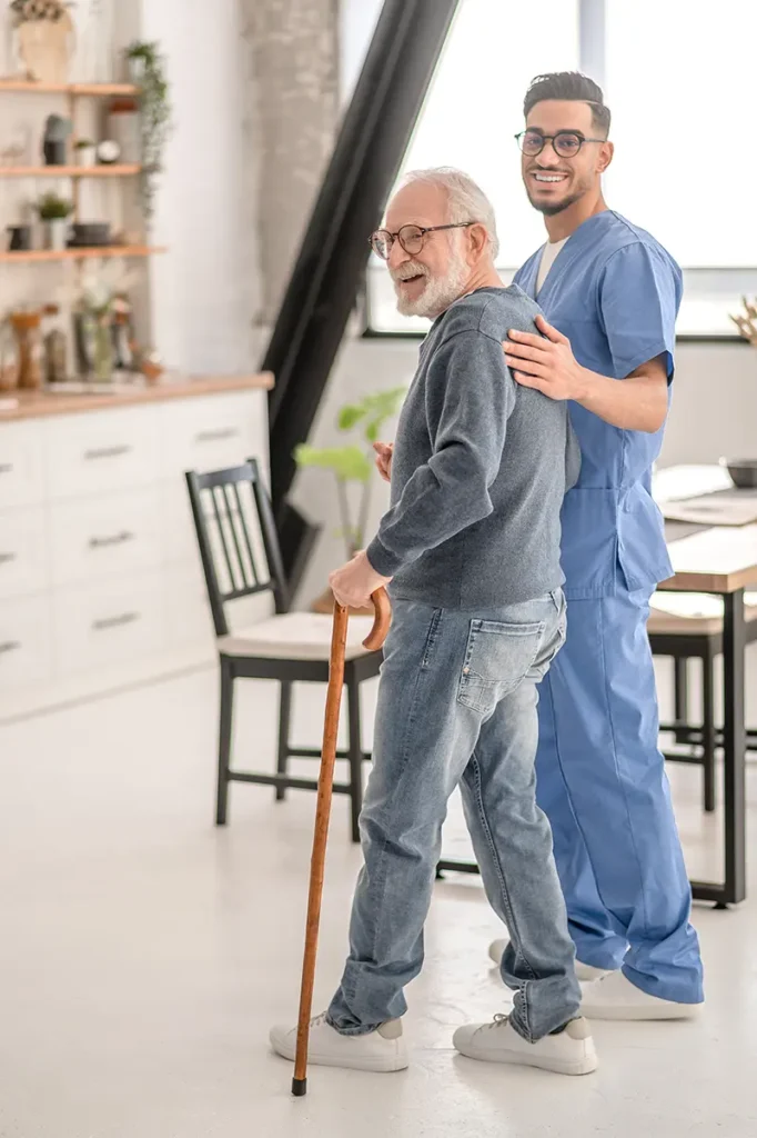 happy senior man and occupational therapist